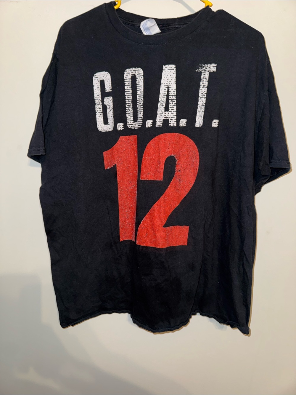 Port and Company Black Tee with White G.O.A.T. Text and Red 12